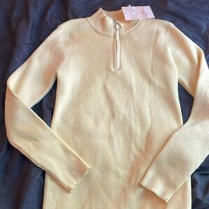 Pastel yellow zip up sweater, never worn, tags still on.
